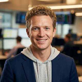 Ryan Brooks, listed as Lead Trading Analyst at Vivid Portioniment, in a profile image
